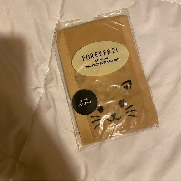 NWT Forever 21 Nude Stockings with Cat 🐱 face on Knees fits Size M/L - Picture 1 of 3